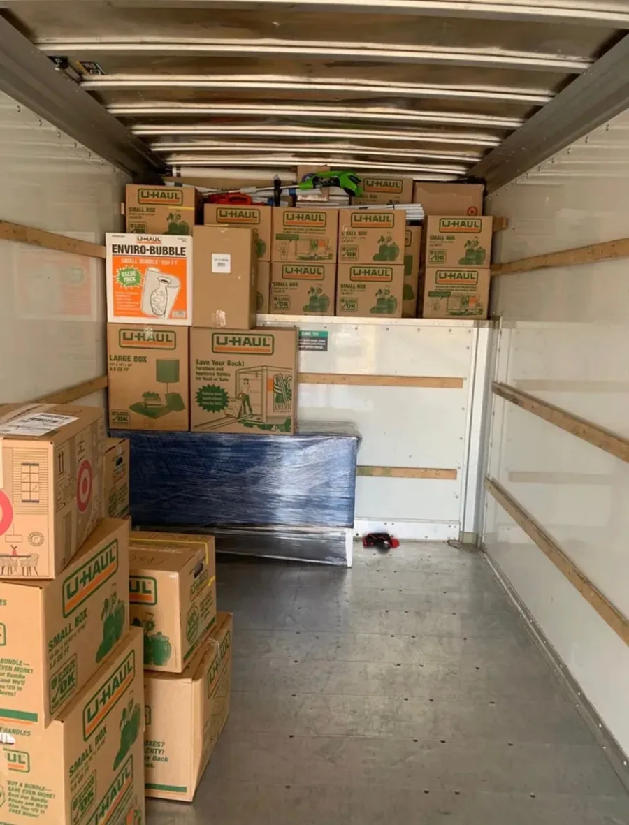 Boxes and equipment loaded inside a moving truck