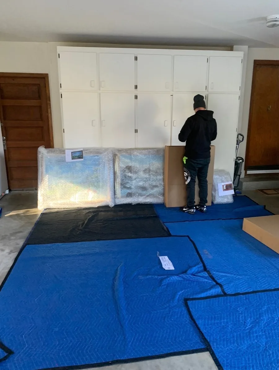 Furniture wrapped and protected inside a home before moving
